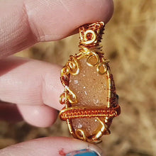 Load and play video in Gallery viewer, Dainty Orange Agate Druzy Pendant
