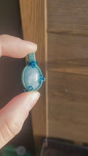 Load and play video in Gallery viewer, Chatoyant Aquamarine Dainty Pendant
